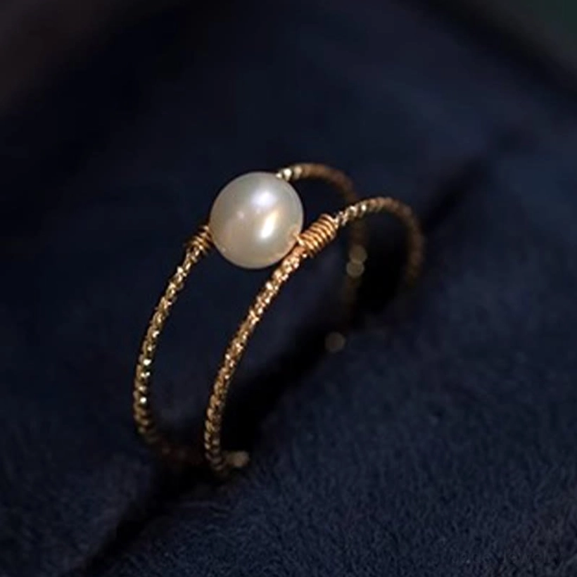 Pearl and jade adjustable rings collection display showing both jade and pearl stone options with twisted bands