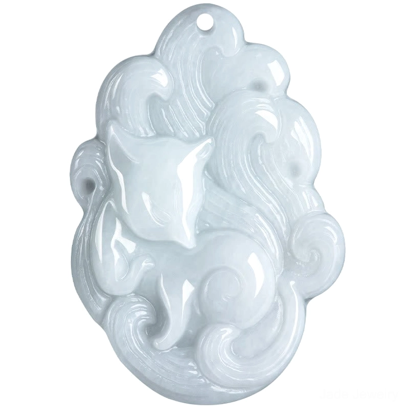 Extreme close-up of hand-carved nine-tailed fox jade pendant showing intricate carving details
