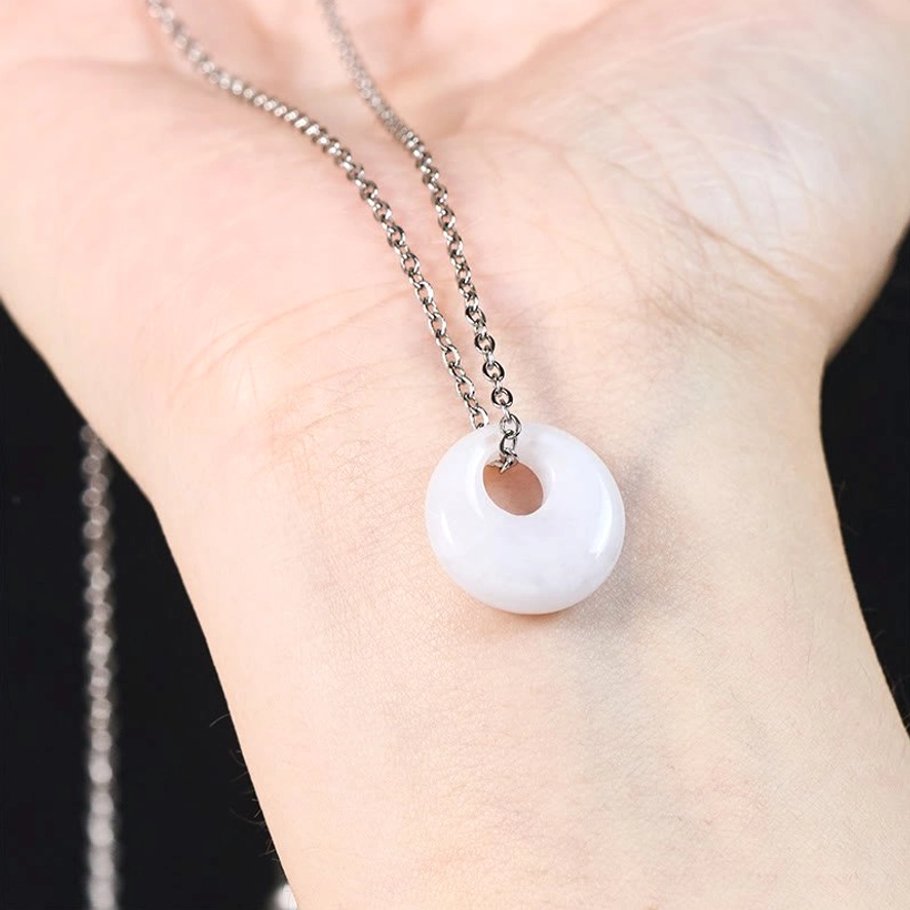 Jade round pendant necklace available in gold and silver finish metal options