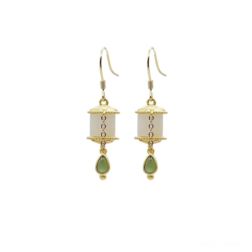 Jade prayer wheel drop earrings for spiritual seekers and mindfulness enthusiasts, combining ancient Buddhist symbolism with modern jewelry design