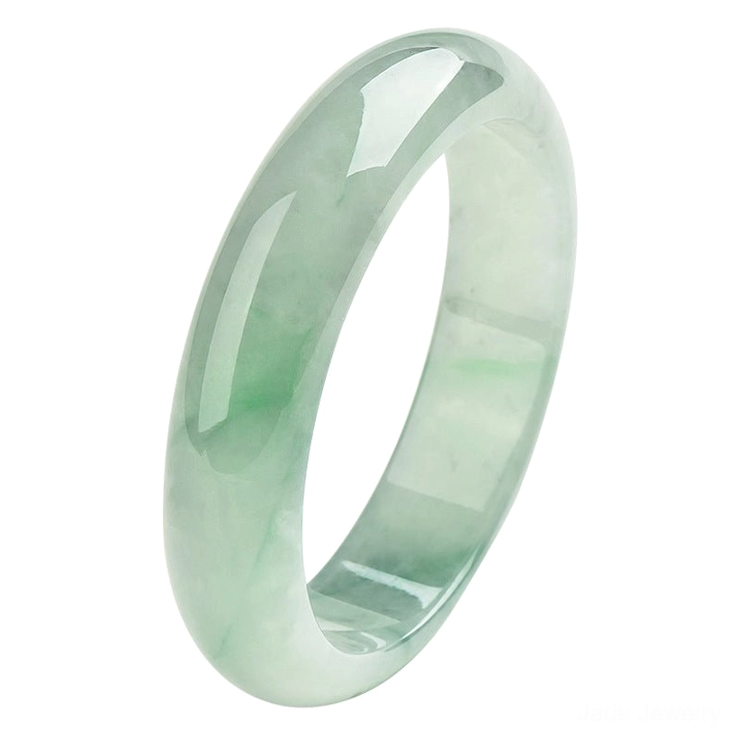 Light green jade bangle with natural floating green patterns, smooth seamless polished surface shown in side flat three-quarter view on neutral background