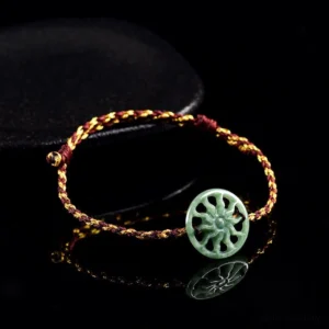 Jade sun bracelet side overhead angle displaying adjustable rope knot and mixed-color woven design