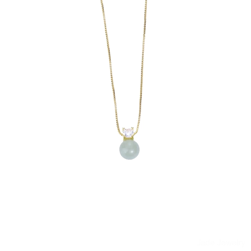Complete light green jade prosperity pendant necklace with round jade bead and 925 sterling silver gold chain on white background