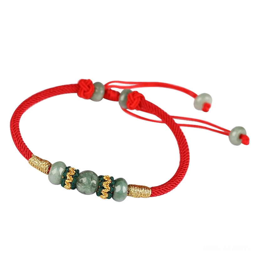 Red string jade prosperity bracelet artistic flat lay photography with natural lighting showcasing authentic beauty