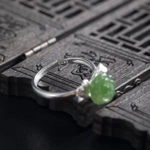 925 sterling silver hallmark stamped on adjustable jade rose ring band, shown on traditional Chinese wooden jewelry box