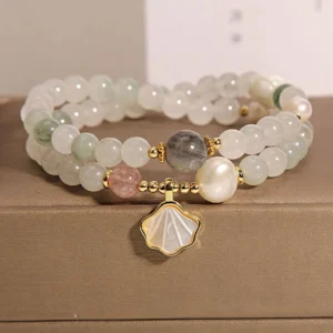 Double-layer jade shell pendant bracelet with white round beads and gold hardware in brown gift box