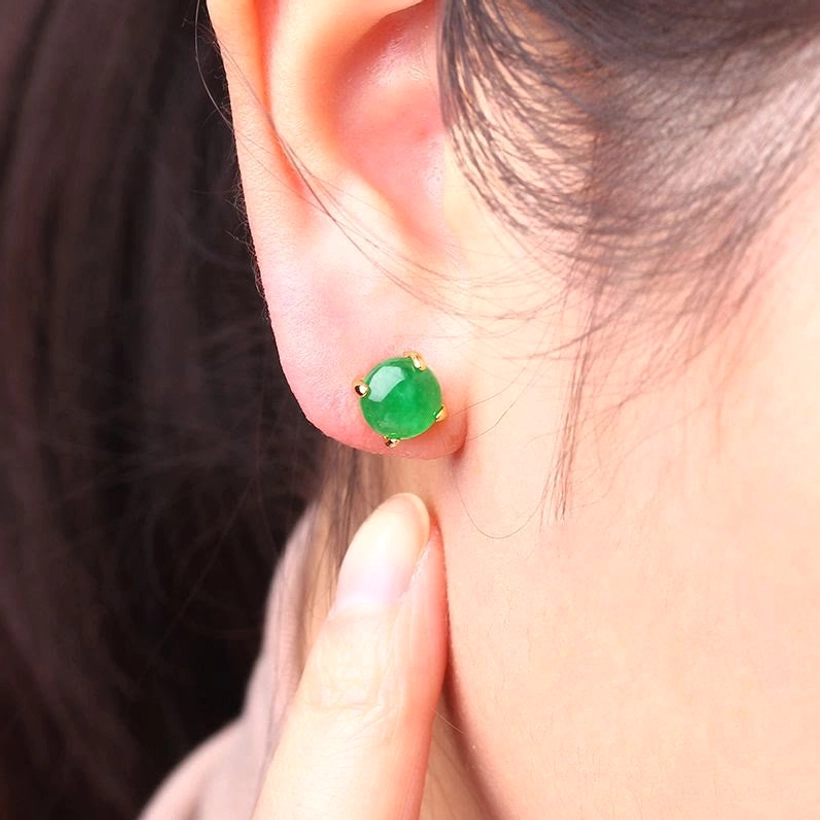 Lifestyle image of jade stud earring worn on earlobe showing minimalist daily wear design