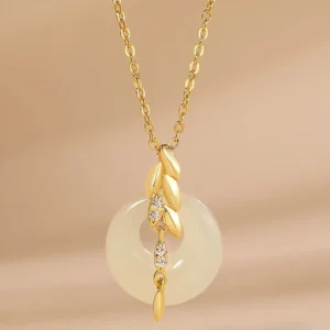 925 sterling silver wheat charm pendant with white jade donut and sparkling crystal details