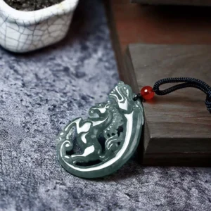 Grey-green polished jade horse-dragon pendant shown from side view, displaying the intertwined carved horse and dragon design with dimensional relief work