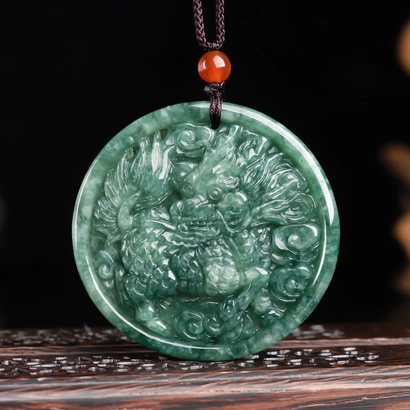 Kirin jade pendant necklace with brown cord and red agate bead detail, straight front showcase