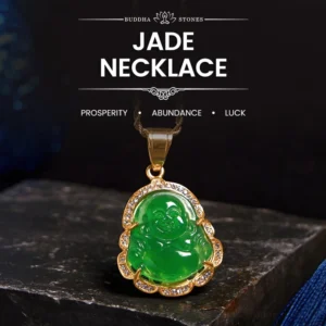 18K gold-filled Laughing Buddha jade pendant necklace with rhinestone details on dark stone background - close-up front view