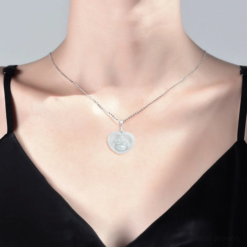 Laughing Buddha heart jade pendant necklace worn on model's neck and upper chest, intimate lifestyle wear view
