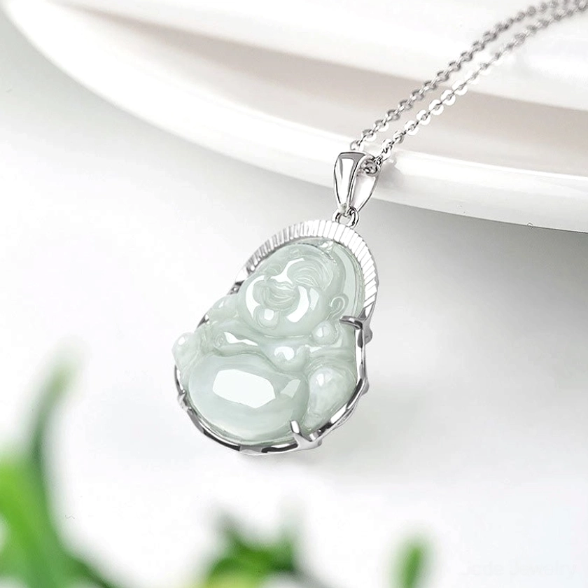 Laughing Buddha jade pendant in vertical profile view showcasing matte light green jade and silver metal frame with carved Maitreya expression