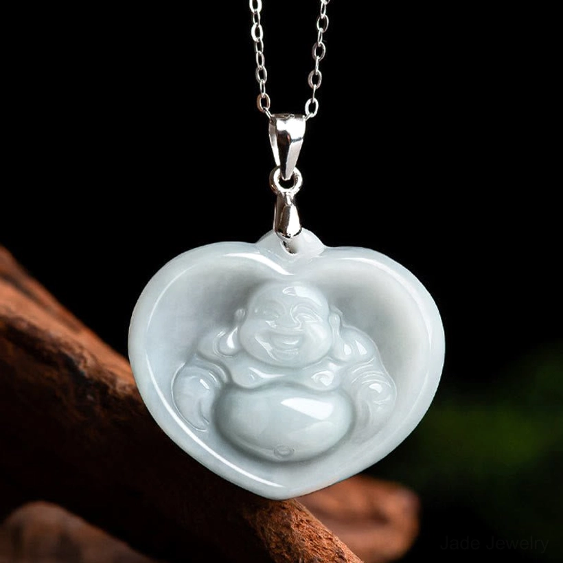 Maitreya Buddha white jade pendant with heart frame design, front flat photography with wooden props