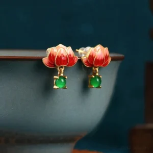 Red lotus enamel gold jade dangle earrings with green jade pendant, detailed side close-up view showcasing cloisonné craftsmanship
