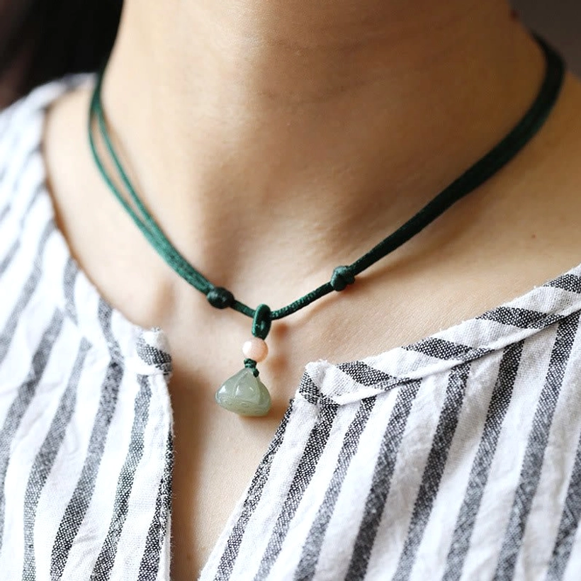 Single-strand lotus jade pendant necklace with dark green cord and carved lotus pendant, neck wear