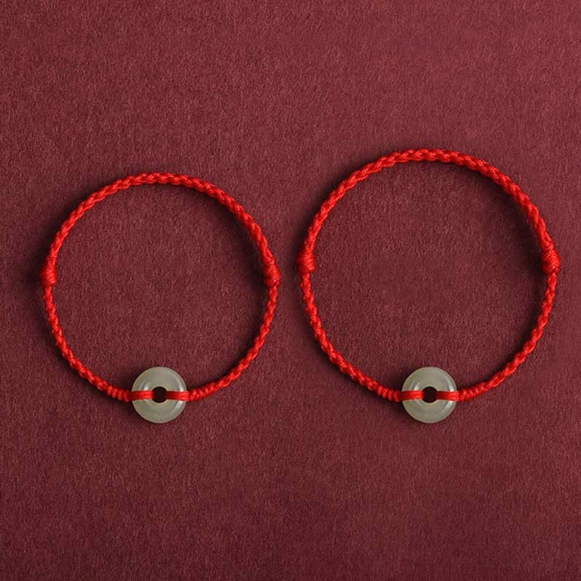 Matching pair of red braided Hetian jade peace buckle bracelets