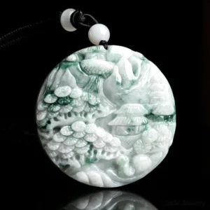Mountain landscape jade pendant necklace featuring natural green jade with carved pavilions and pine trees, shown in front top-down view on black background
