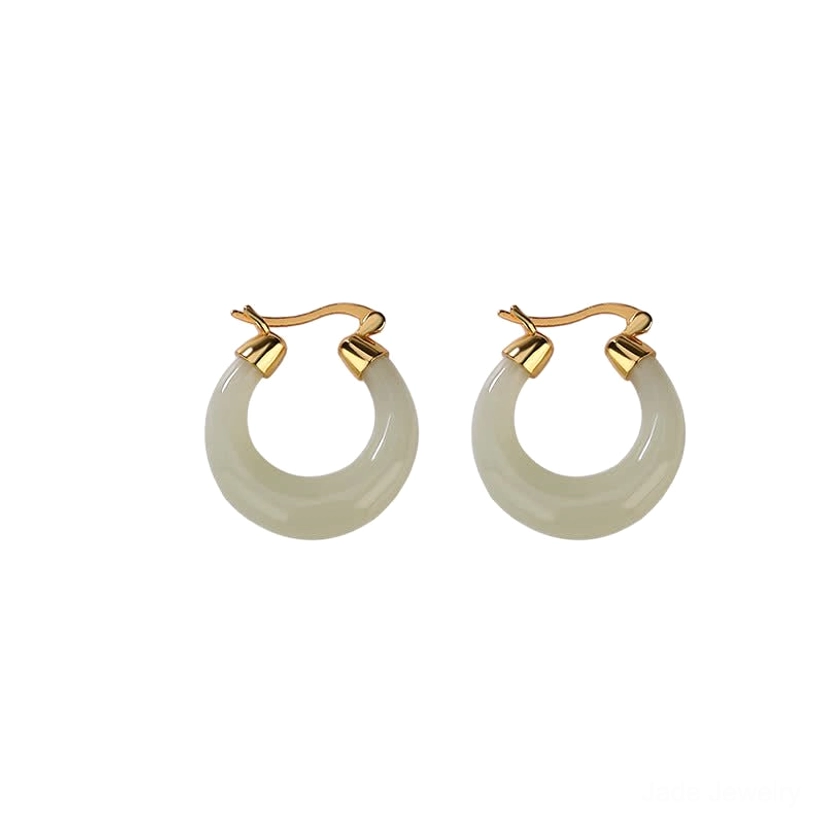 Pair of uniform natural jade drop earrings with gold lever-back closures on neutral plain background, showcasing minimalist design and solid jade color