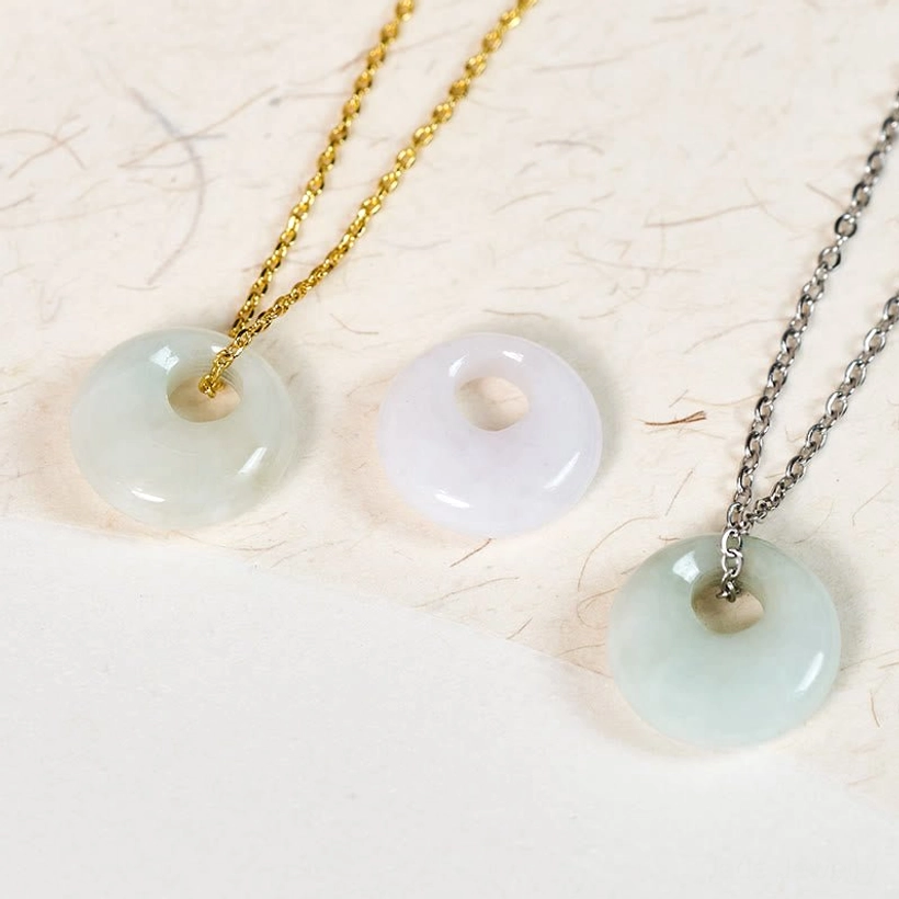 Pale jade round pendant necklace detail shot highlighting stone quality and translucency
