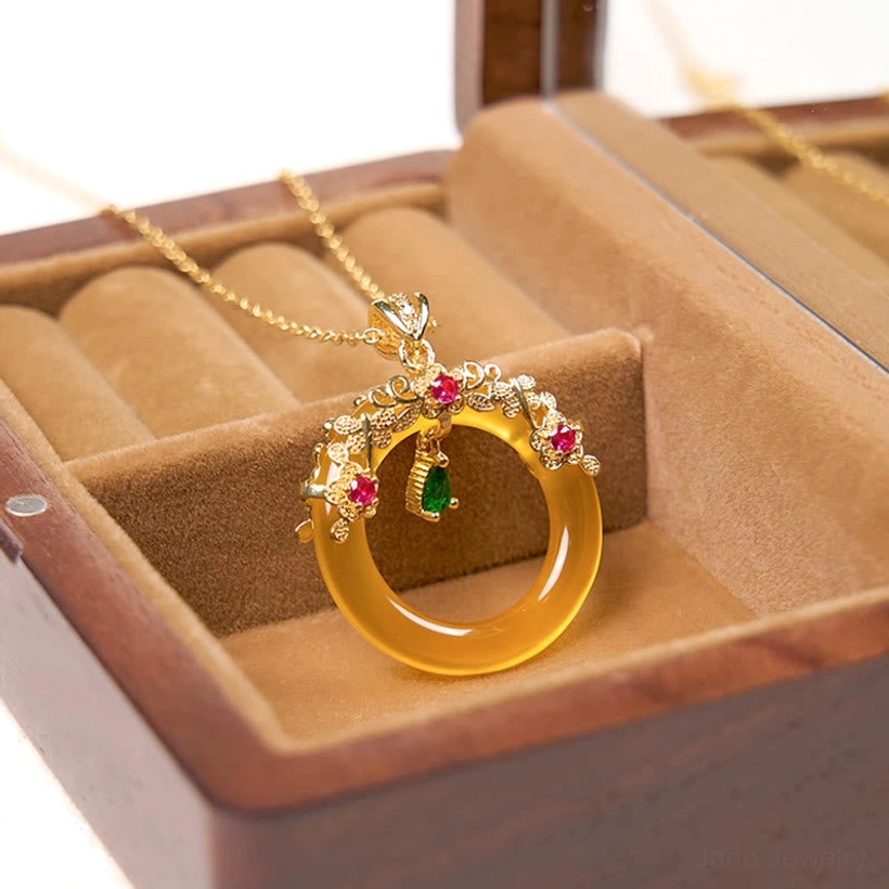 Peace buckle pendant with copper alloy filigree and natural chalcedony stone