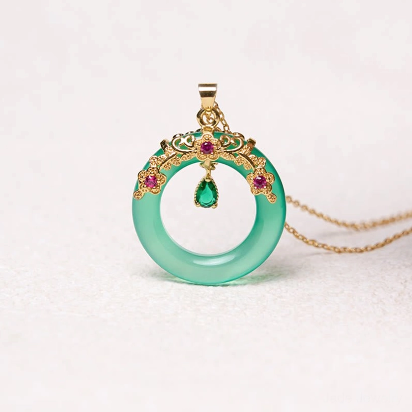 Green chalcedony peace buckle pendant with full gem-studded gold frame and dangling charm