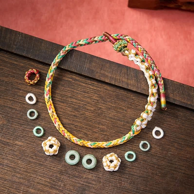 Peach blossom jade fortune bracelet handcrafted red cord detail