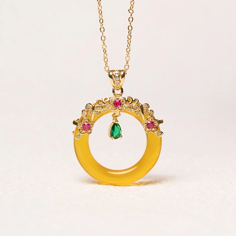 Green chalcedony peace buckle pendant demonstrating Ping An Kou tradition