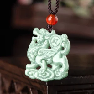 Jade Pixiu fortune pendant with coin ornament detail and cloud-shaped base on adjustable black necklace cord