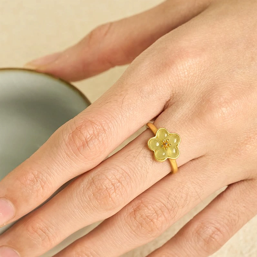 Plum Blossom Hetian Jade Ring - First-person wear view on middle finger demonstrating natural fit and delicate daily styling