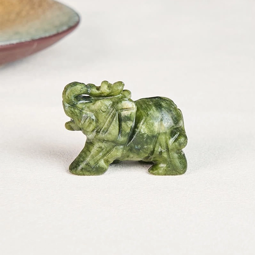 Polished healing stone elephant figurine crafted by master stone carvers