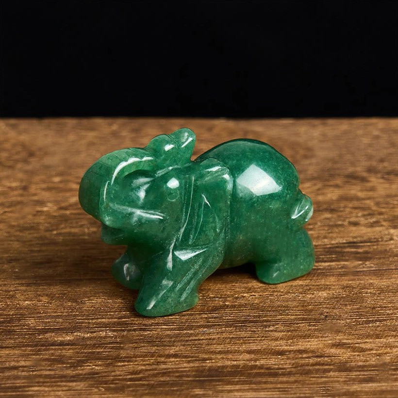 Polished stone elephant figure with natural beauty and positive energy meaning