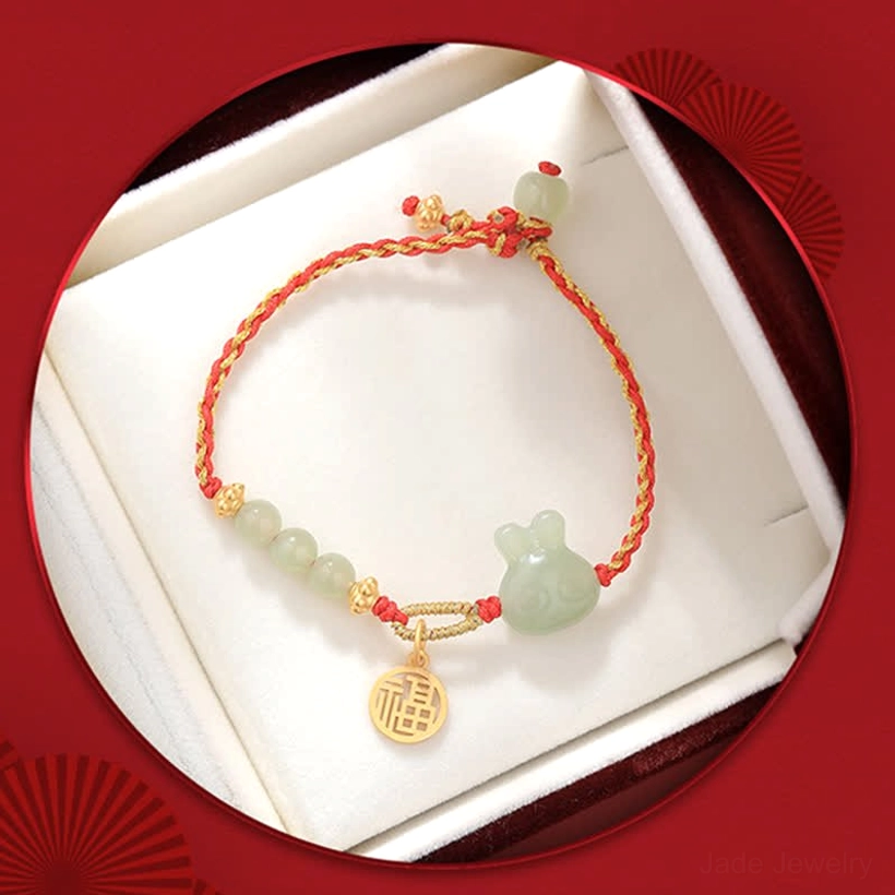Rabbit jade fortune bracelet in gift box with red satin lining and braided rope detail