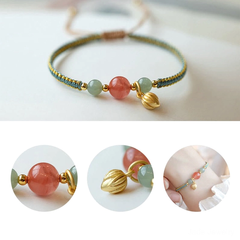 Overhead flat lay view of red agate lotus bracelet showing all beads and gold pendant charm