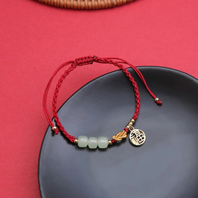 Red string jade Fu bracelet - traditional Chinese symbol of happiness and good fortune combined with protective jade stone