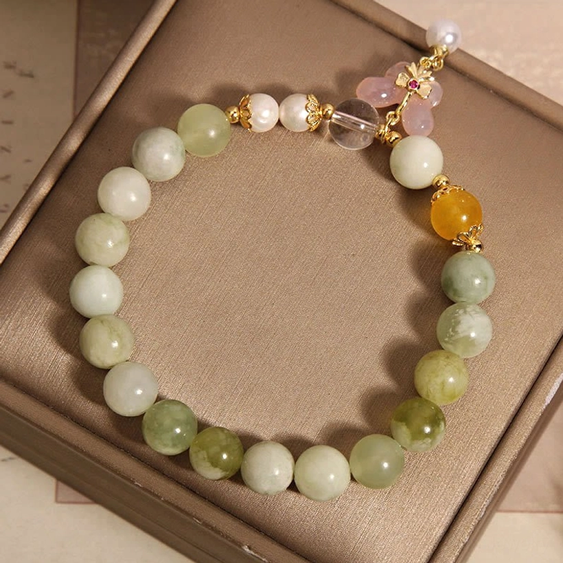 Serpentine jade butterfly prosperity bracelet complete product shot for e-commerce display
