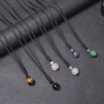 Complete seven-stone harmony necklace showing all six gemstone varieties laid out