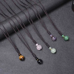 Complete seven-stone harmony necklace showing all six gemstone varieties laid out