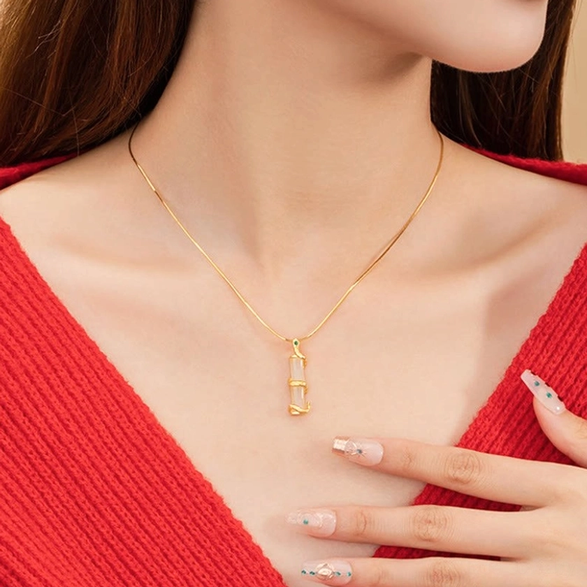 Snake jade bamboo necklace on female neck - dainty minimalist sterling silver chain styling for daily wear
