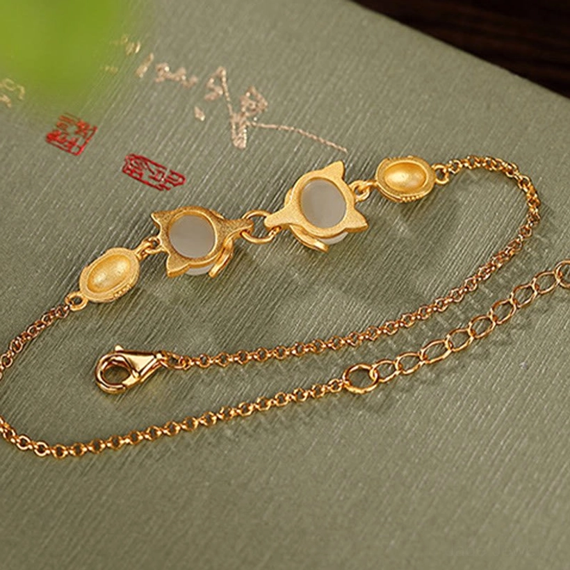 Sterling silver 925 hallmark and jade authenticity certification detail for Hetian jade bracelet