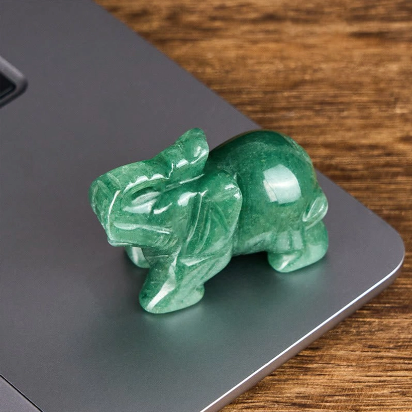 Stone elephant carved from genuine healing crystal for spiritual practice