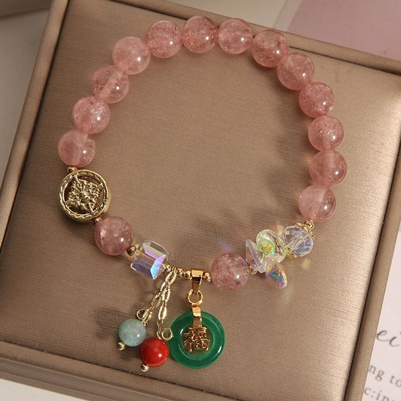 Strawberry quartz Fu charm bracelet displayed in elegant jewelry gift box with pink quartz beads and jade pendant