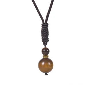 Tiger Eye gemstone necklace featuring golden-brown striped beads with gold spacer rings
