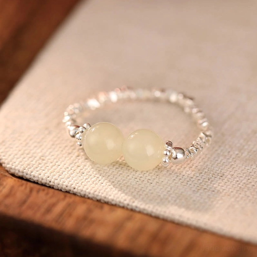 Two Hetian jade beads elastic ring with matching pale green stones and 925 sterling silver