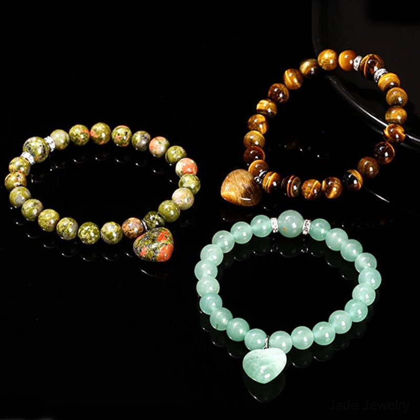 Unakite heart bracelet on wrist showing comfortable flexible fit