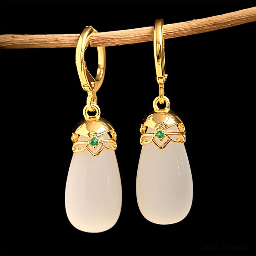 White chalcedony jade earrings hanging display pale stone copper ear posts minimalist elegant design