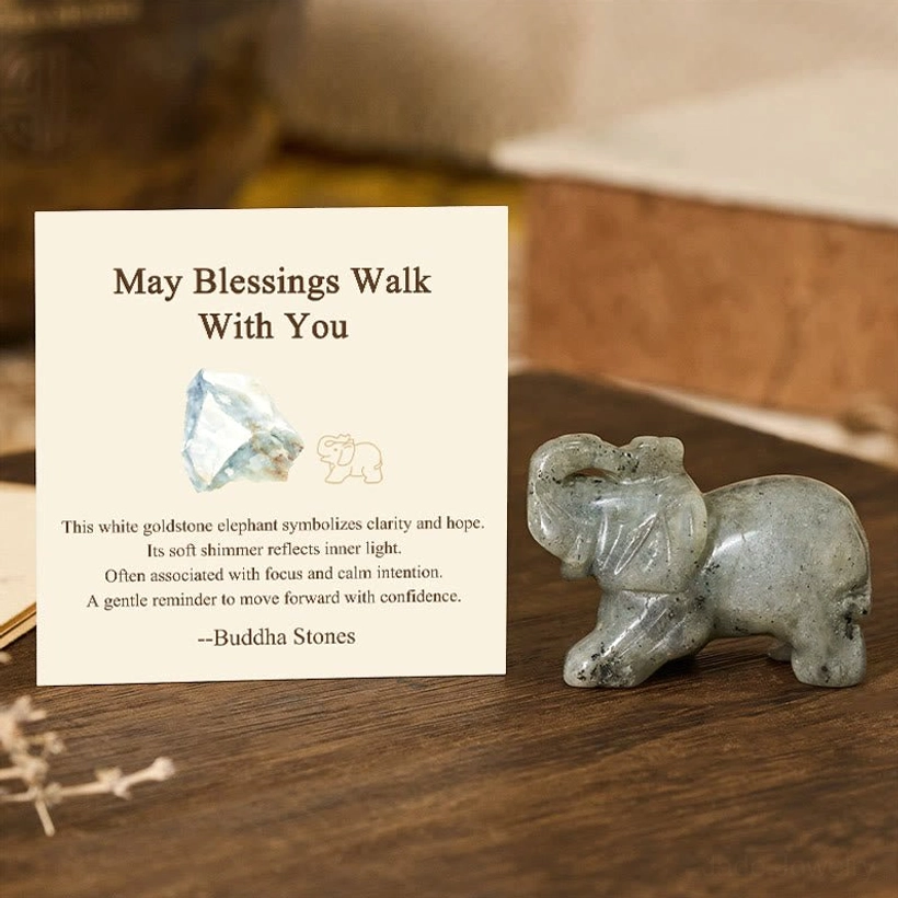 White goldstone elephant stone figurine with clarity and hopeful shimmer