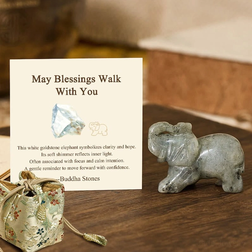 White goldstone elephant figurine reflecting inner light hope and possibility