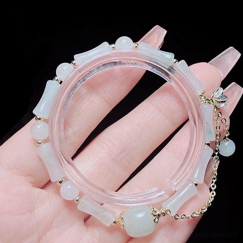 Natural Tianshan white jade beads with delicate bamboo carving, showcasing the stone's luminous milky-white color and texture