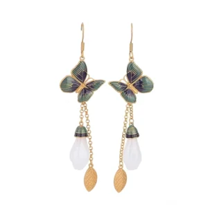 White jade butterfly dangle earrings with enamel butterfly charm and gold hardware on white background